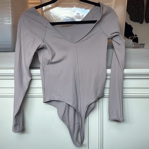 Lululemon bodysuit. Size 8. Worn a couple of times. Lilac in colour - Picture 2 of 2